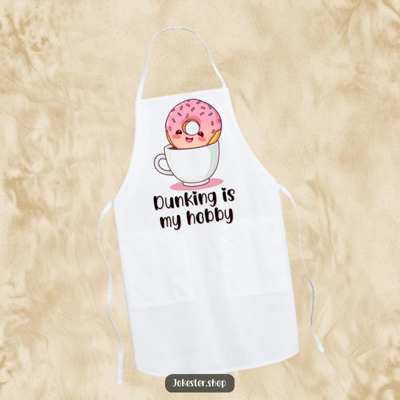 Funny kitchen apron illustrating a giggling donut with sprinkles taking an inverted dive into a coffee cup.