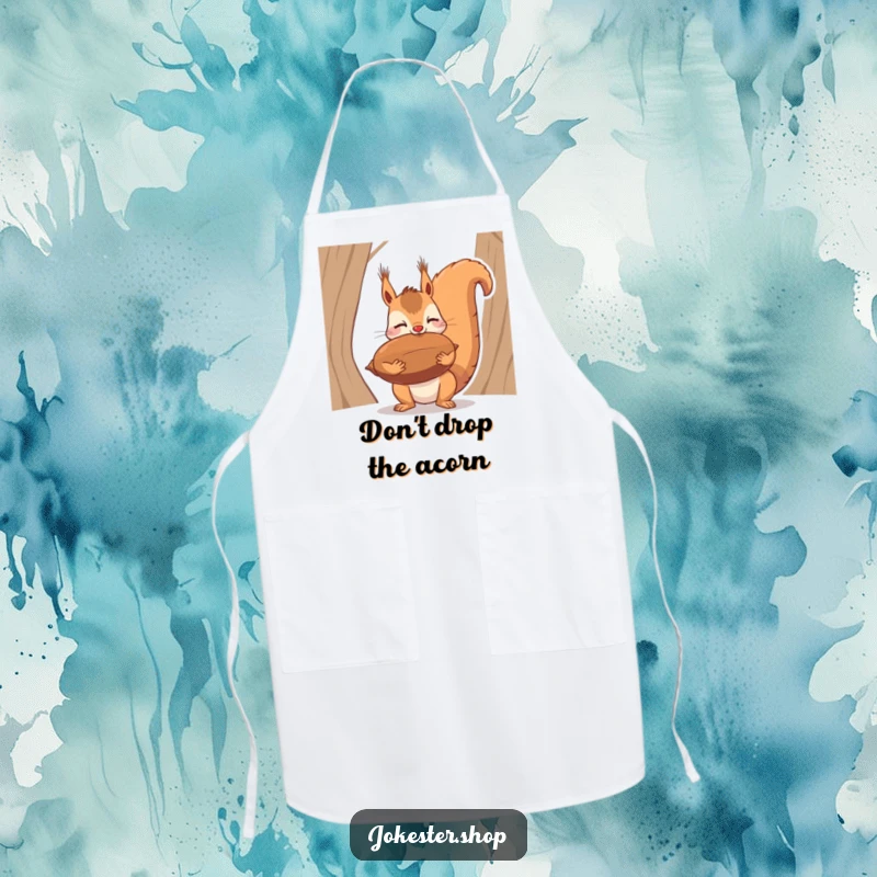Funny apron print of a squirrel attempting to balance a large nut on its nose, a comical kitchen accessory.
