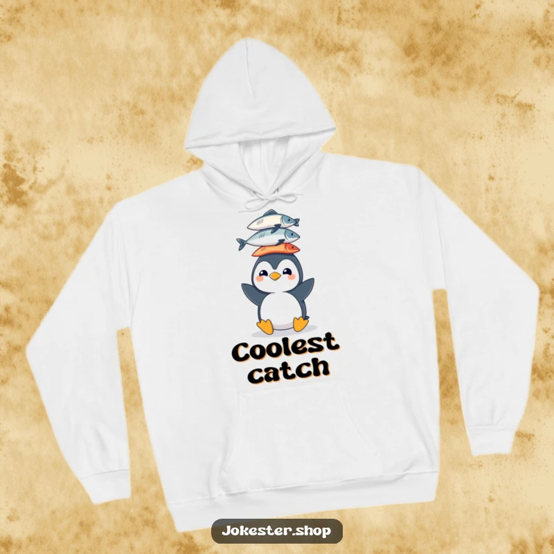 Funny hoodie featuring a cheerful penguin character skillfully balancing a tall stack of slippery fish on its head, designed for warmth and smiles.