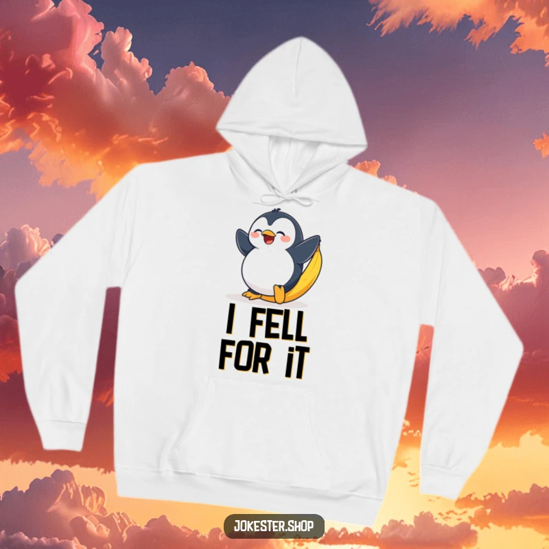 Funny hoodie depicting a plump penguin dramatically slipping with exaggerated surprise on a yellow banana peel.