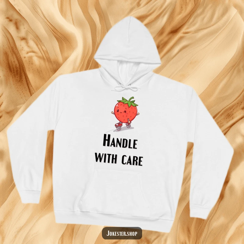 Funny plump strawberry in roller skates, precariously wobbling downhill, on a soft, warm hoodie.