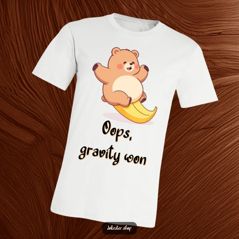 Funny bear t-shirt illustrating a plump bear hilariously attempting to climb a very slippery banana peel, highlighting comical failure.