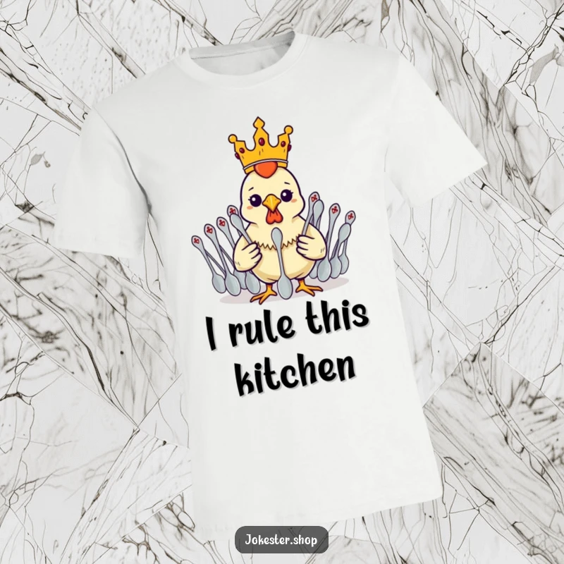 Funny rubber chicken in a small crown, majestically commanding a loyal army of spoons on a graphic tee.
