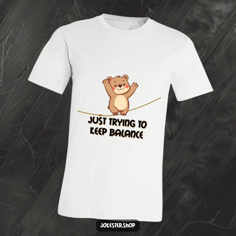 Funny t-shirt featuring a clumsy bear flailing its arms while attempting to tightrope walk, a comical depiction of a hilarious failure.