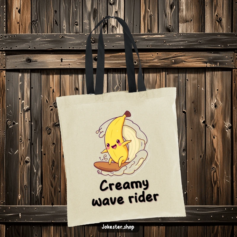 Funny tote bag showing a happy banana character attempting to surf a large wave of flowing cream.